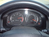 235 km/h :D nije mogao brze :S